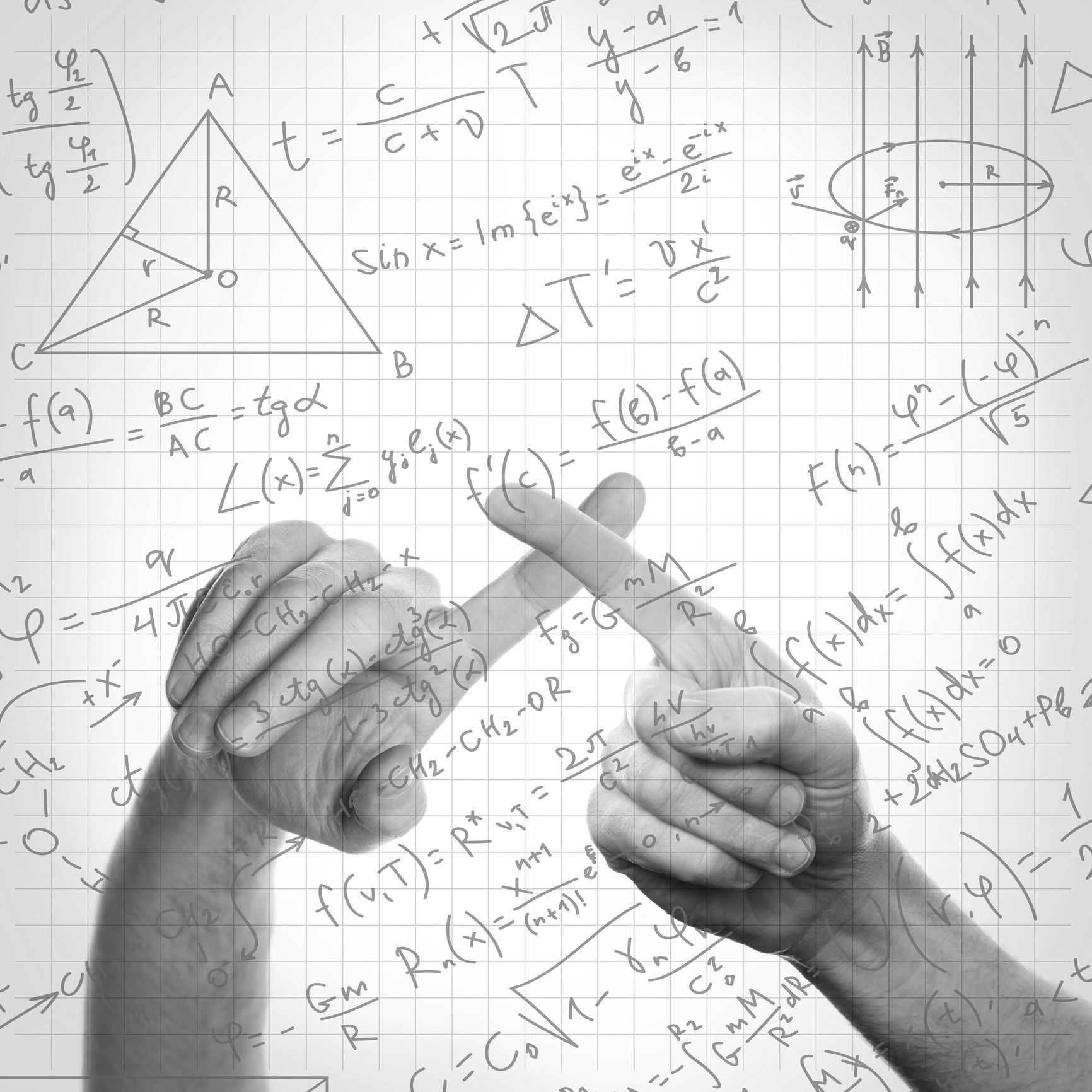 Two hands crossing fingers with mathematical formulas on graph paper.