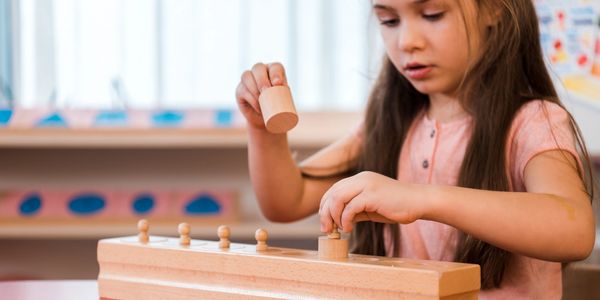 “Knobbed cylinders help the child refine their senses and self-correct with precision.”