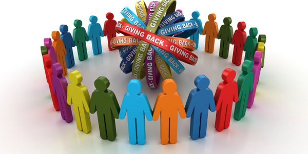 Colorful figures in a circle around 'Giving Back' ribbons.