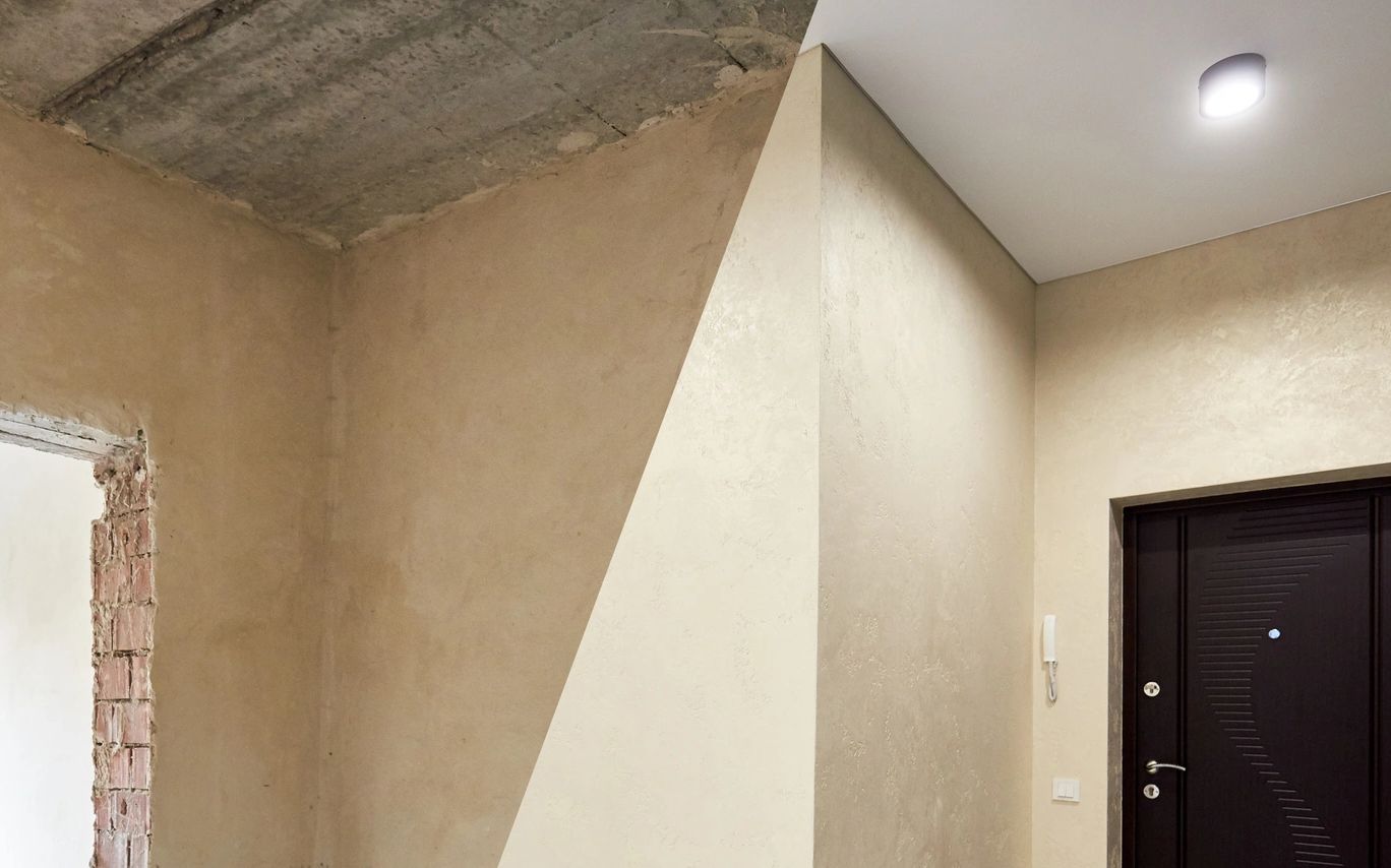 A split view of an unfinished and finished room hallway with a door.