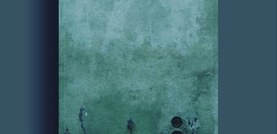 Green textured wall with dark stains and marks.