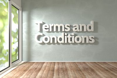 3D text 'Terms and Conditions' on a wall in a bright room with wooden floor.