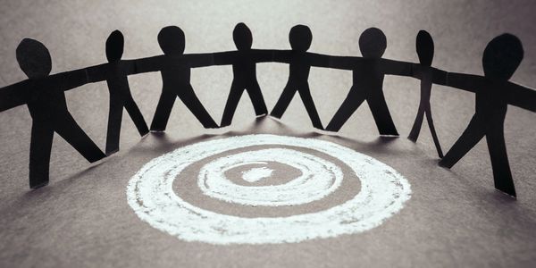 Group of figures standing in a semi-circle showing healthy relationships.