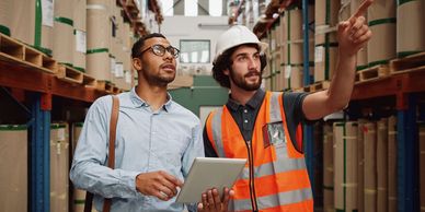 A client and occupational therapist discussing work demands, representing job site visit services