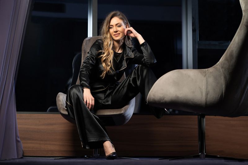 Beautiful woman posing in fashionable pantsuit