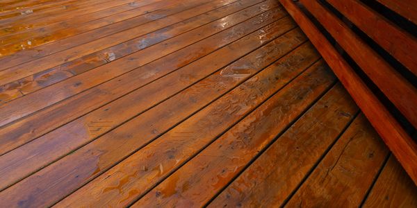 A freshly refinished deck in Colorado Springs by Joy Painting 