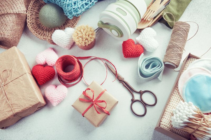Set of eco presents laid out on the table. Zero waste gift wrapped in paper.
