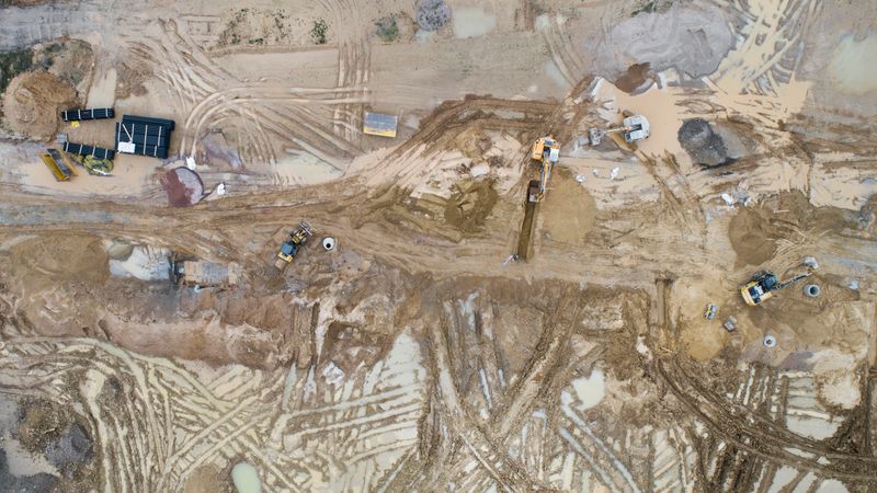 Large muddy construction site - aerial view
