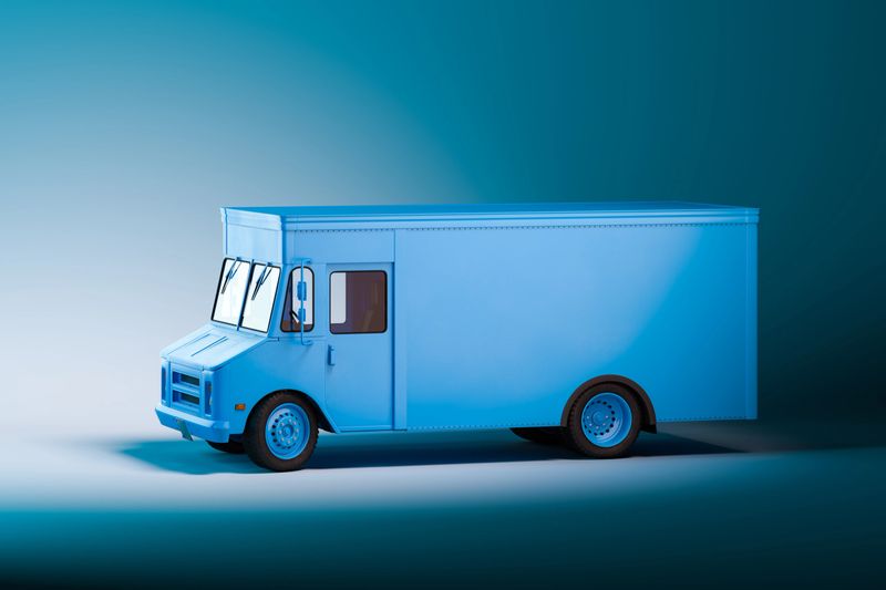 Side View Of White Blank Food Truck With on Illuminated Background. Cold Light. Takeaway food and drinks. 3d rendering.