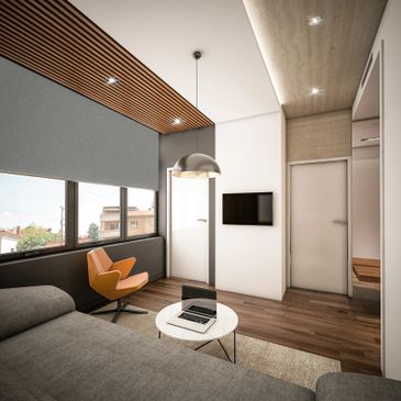 Modern living room with gray sofa, orange chair, and wooden accents.