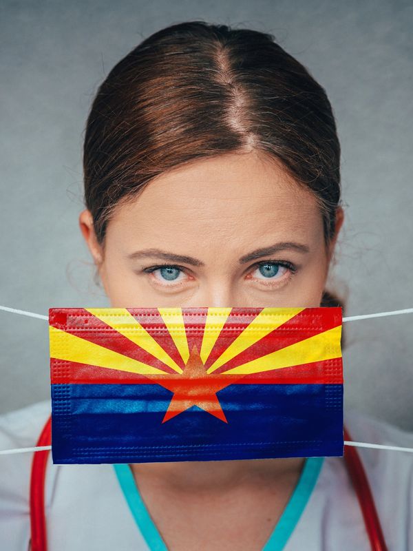 Woman wearing a face mask with Arizona state flag design.
