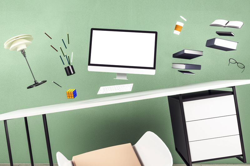 Minimalistic green office interior with jumping computers and supplies. Business objekt and occupation concept. 3D Rendering