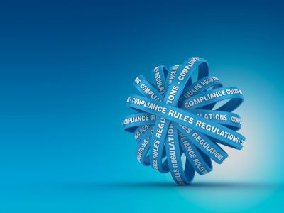 Blue sphere made of compliance and regulations ribbons.