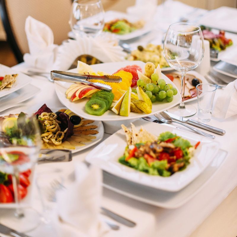 Served table at a wedding celebration with beautiful dishes