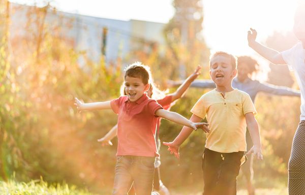 a boy naked in the room and looking on the