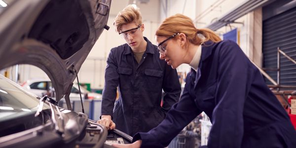 Autocar Light Vehicle Apprentice working on a car 