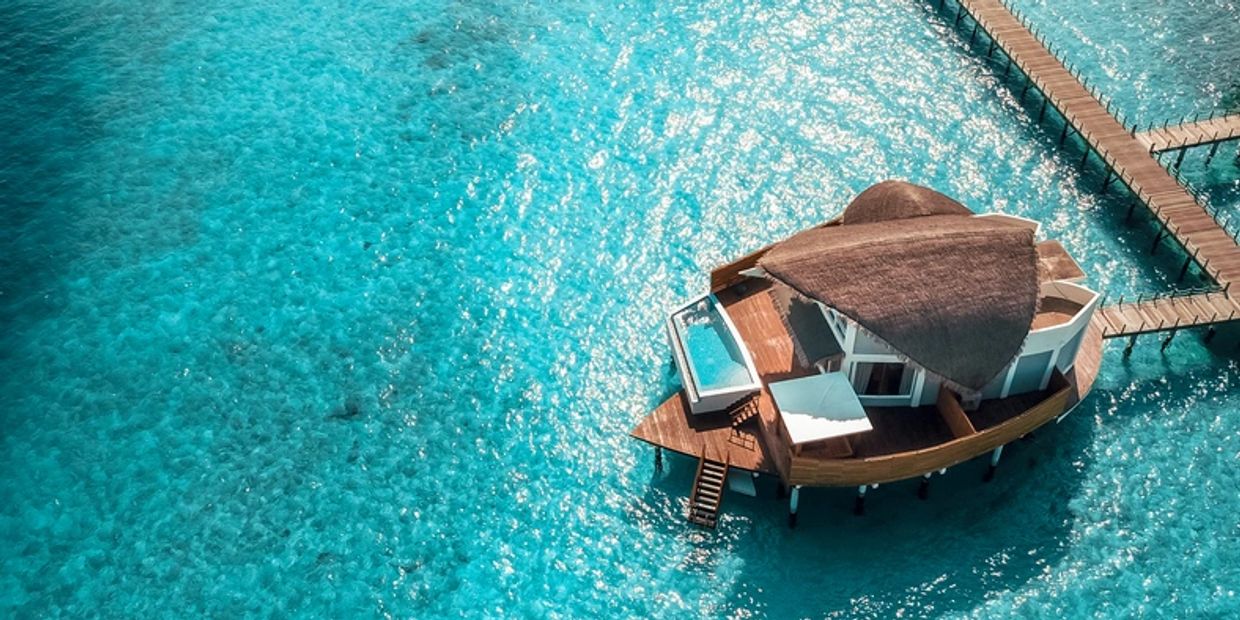 Pilates in your own water villa in Maldives.