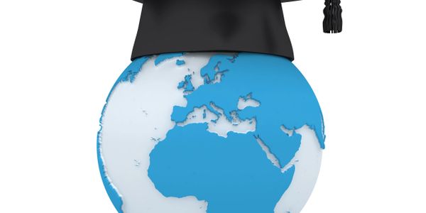 Graduation cap on a globe symbolizing global education.
