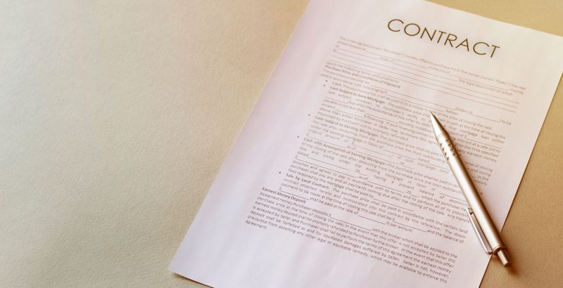Legal contract signing - buy sell real estate contract