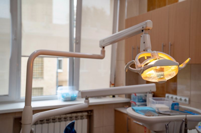 the lamp in the dental office over the patient chair. visit to the stomatologist. treatment, hygiene and prosthetics.