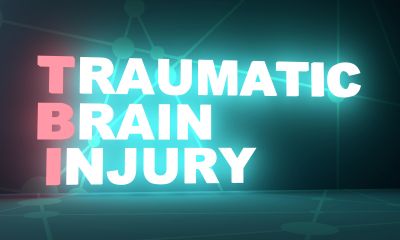Text highlighting traumatic brain injury with glowing effect.