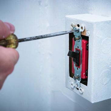 Changing out a light switch.