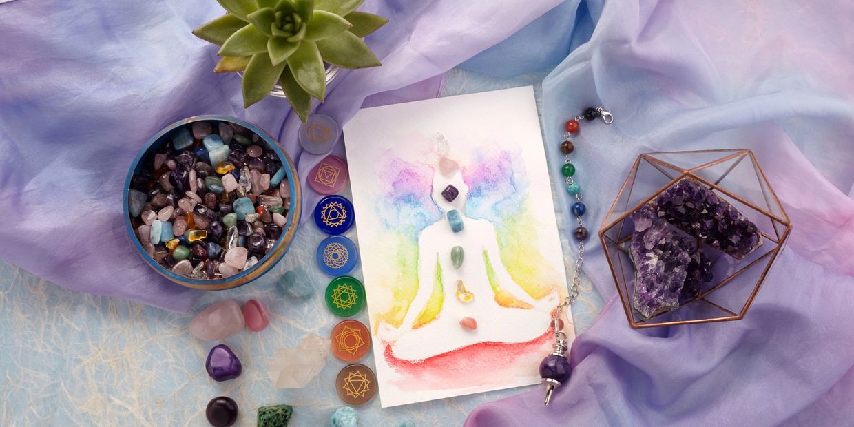 Meditative chakra artwork with crystals and gemstones.