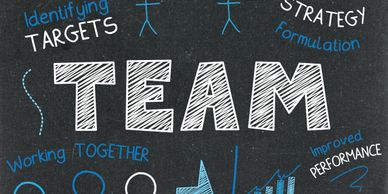 Chalkboard illustration showing teamwork concepts like ideas, strategy, and efficiency.