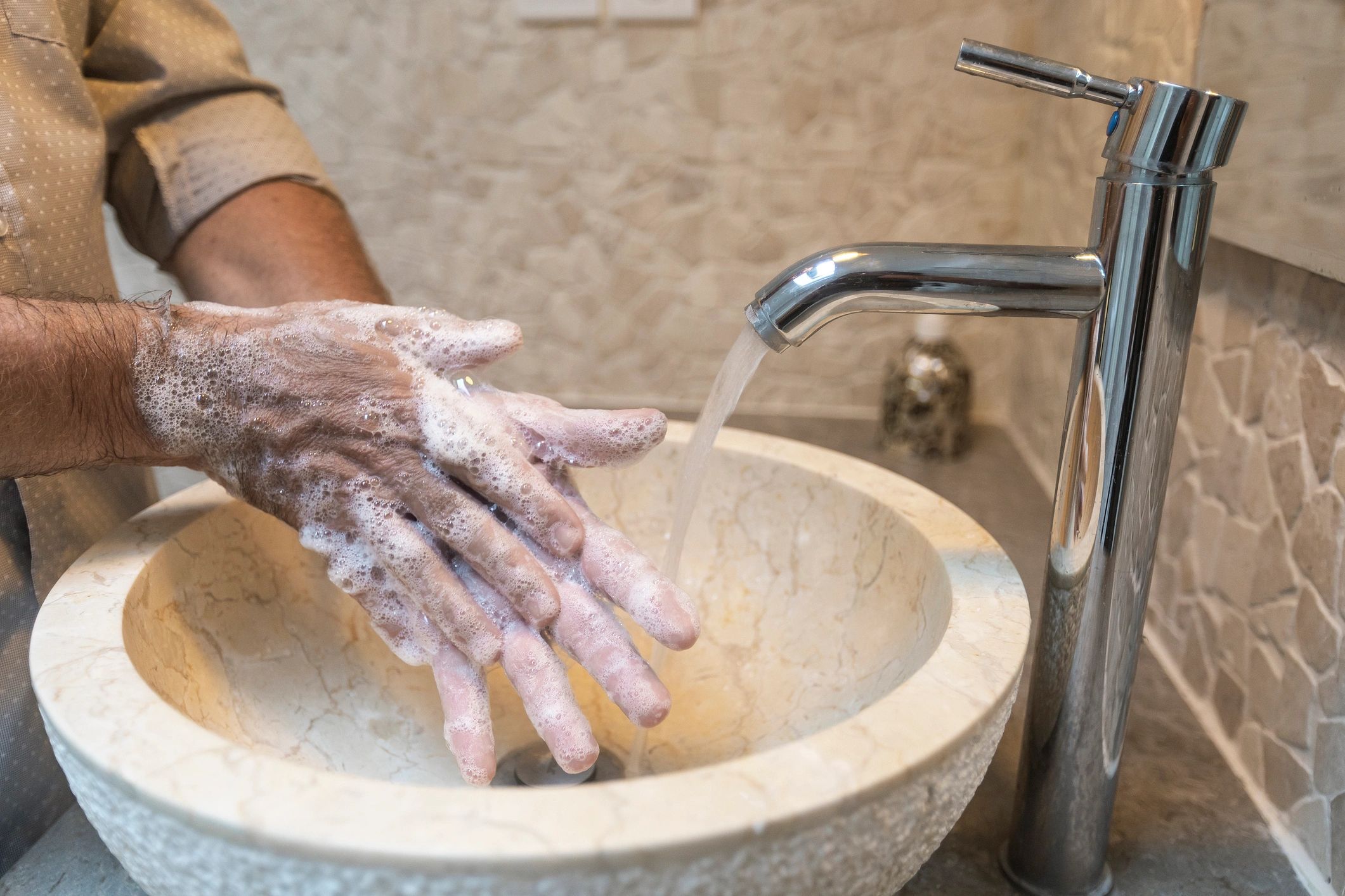 Why Hand Washing After Using the Range Matters