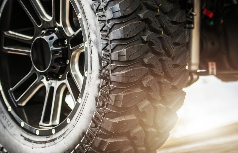 Off Road Vehicle Suspension and Heavy Duty Tires. Extreme Offroading Theme.