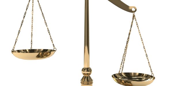 Uneven golden balance scale.