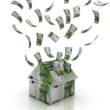House made of euro banknotes with falling money.