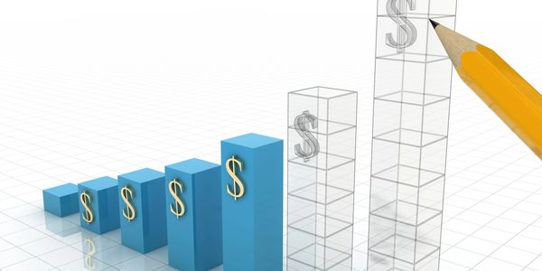 3D bar graph with dollar signs and a pencil pointing at the tallest bar.