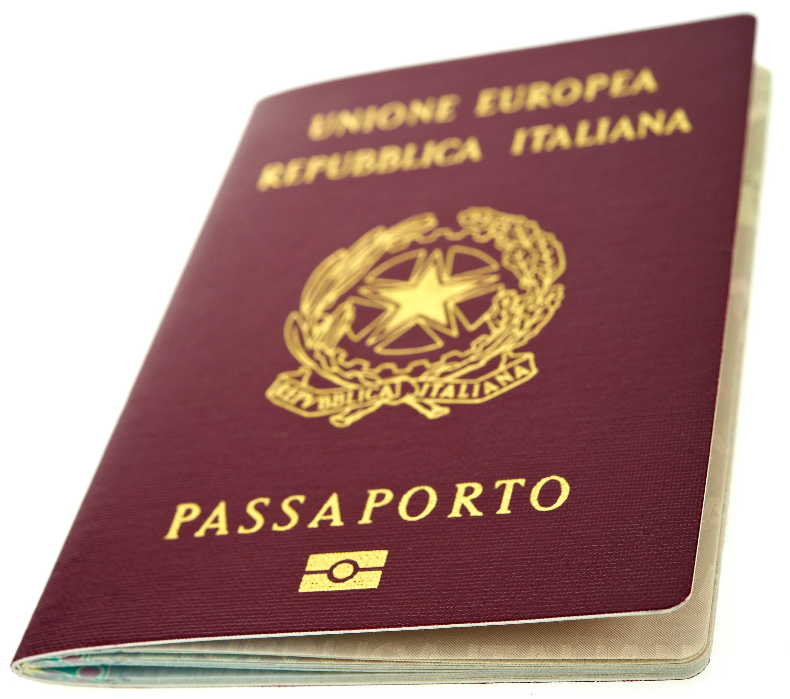 Close-up of an Italian passport with maroon cover and gold lettering.