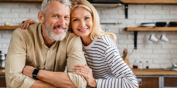 happy man and woman feeling healthy after finding functional medicine in Owasso with Pathway Health