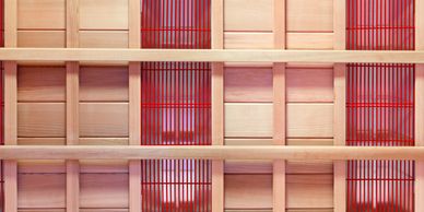 Infrared sauna inside wall, showing cedar and coated safety heaters.