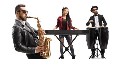 Three musicians playing saxophone, keyboard, and drums.