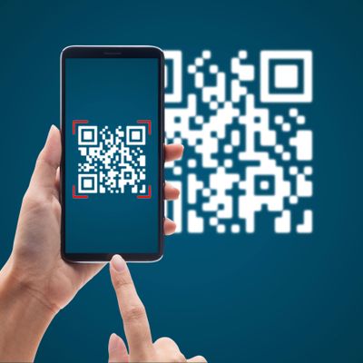 Smartphone scanning a QR code with a blue background.