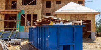 Construction site clean-up debris in a Amarillo Dumpster Rentals like dumpster