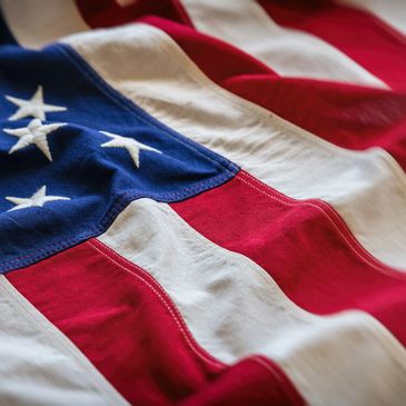 Close-up of a wrinkled American flag showing stars and stripes.