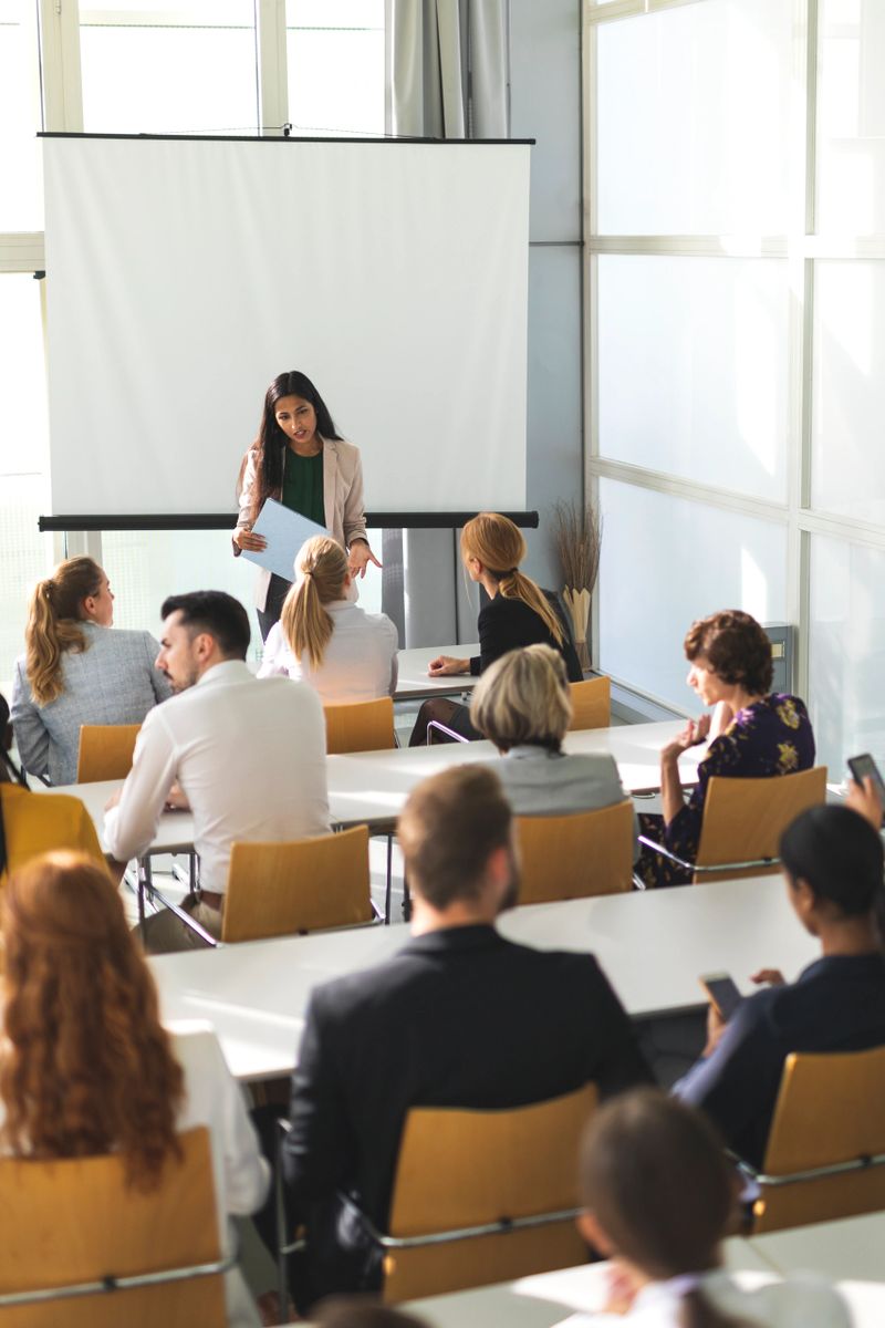 A group of business people attending an educational event