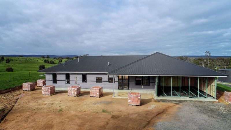 Aerial photo of a residential house being built in rural Victoria