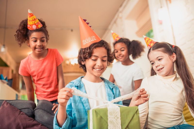 Children celebrating and gifting birthdays