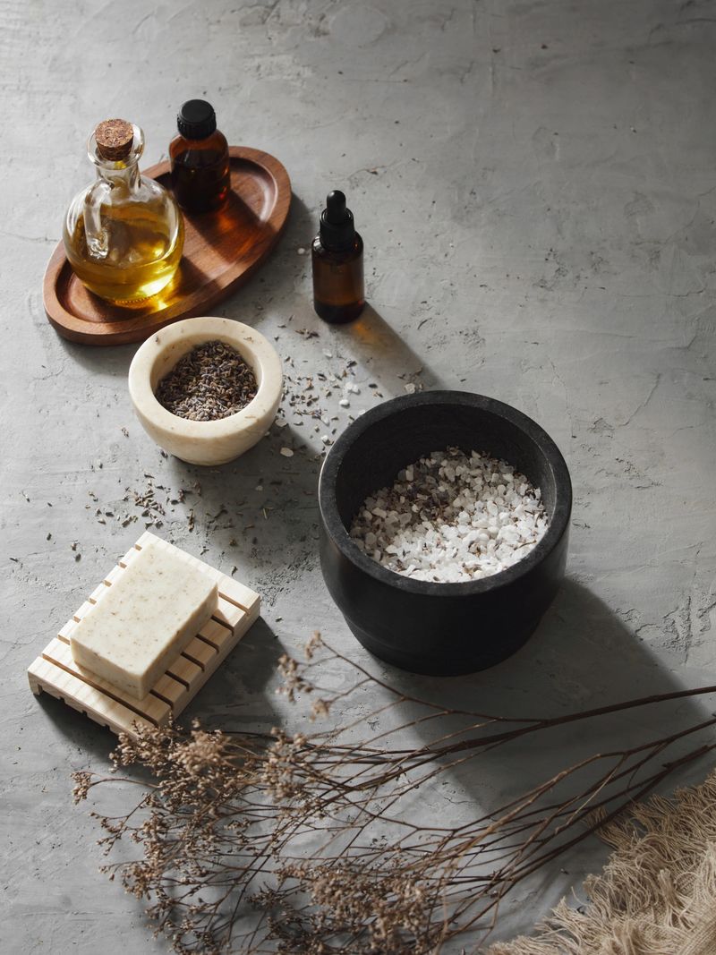 Natural cosmetic products and ingredients: soap, olive oil, serum, lavender and sea salt