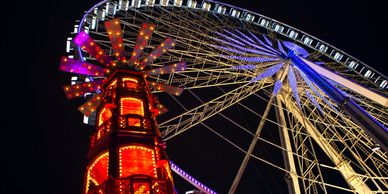 amusement park lit up at night