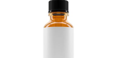 Amber bottle with black cap and blank white label.