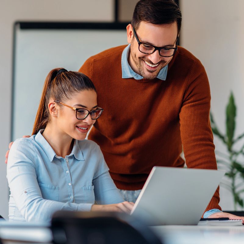 Software engineers working together in the office