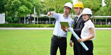 The designers and clients agreeing on the final landscape design