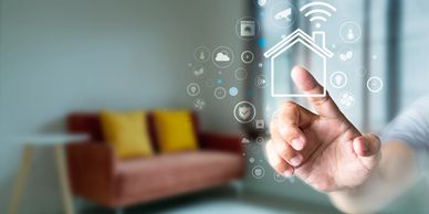 Hand interacting with smart home control icons in a modern living room.