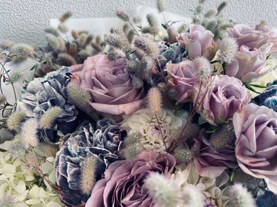 Bouquet of pale pink, lilac and cream flowers 
